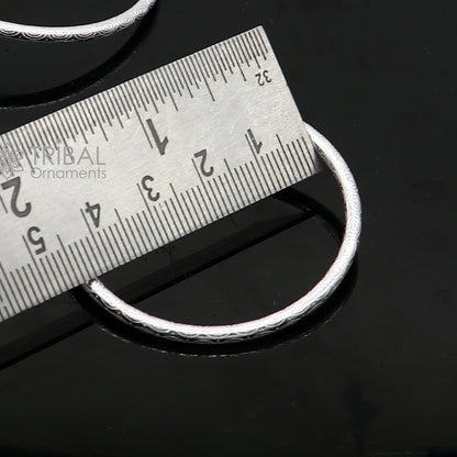 Sterling silver Lord Shiva bangle for kids featuring Shiva and trident designs, crafted by Tribal Ornaments.