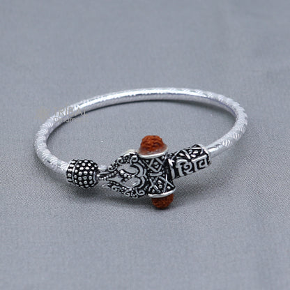 Sterling silver Lord Shiva Trident bangle for kids, featuring intricate design and traditional Indian jewelry style.