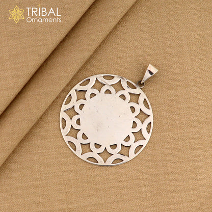 Sterling silver mandala pendant from Tribal Ornaments featuring intricate tribal design jewelry.