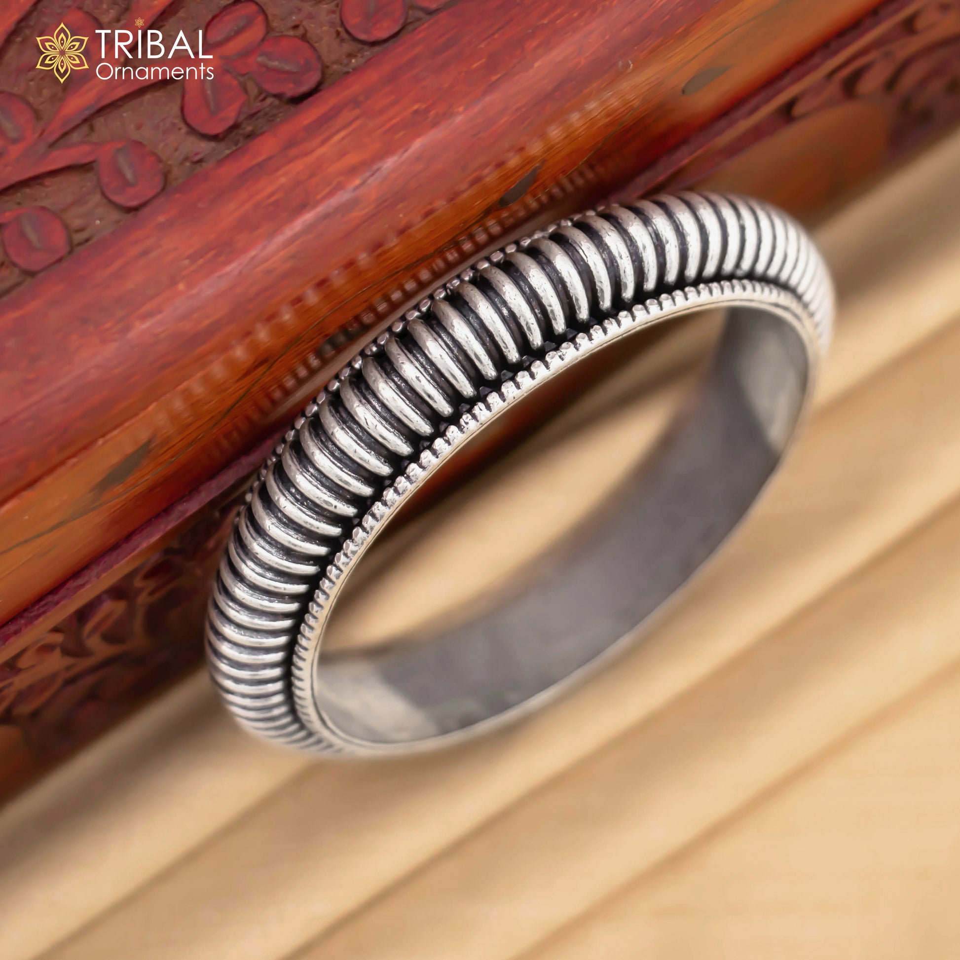925 Sterling silver tribal bangle bracelet by TRIBAL ORNAMENTS, modern trendy unisex cultural jewelry with personalized design.
