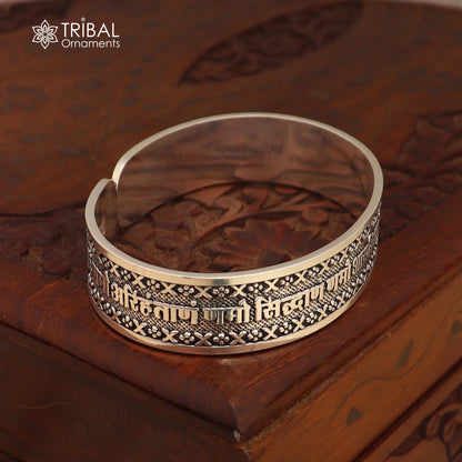Unisex 925 sterling silver Navkar Mantra bangle cuff bracelet with engraved spiritual symbols for tribal jewelry style.