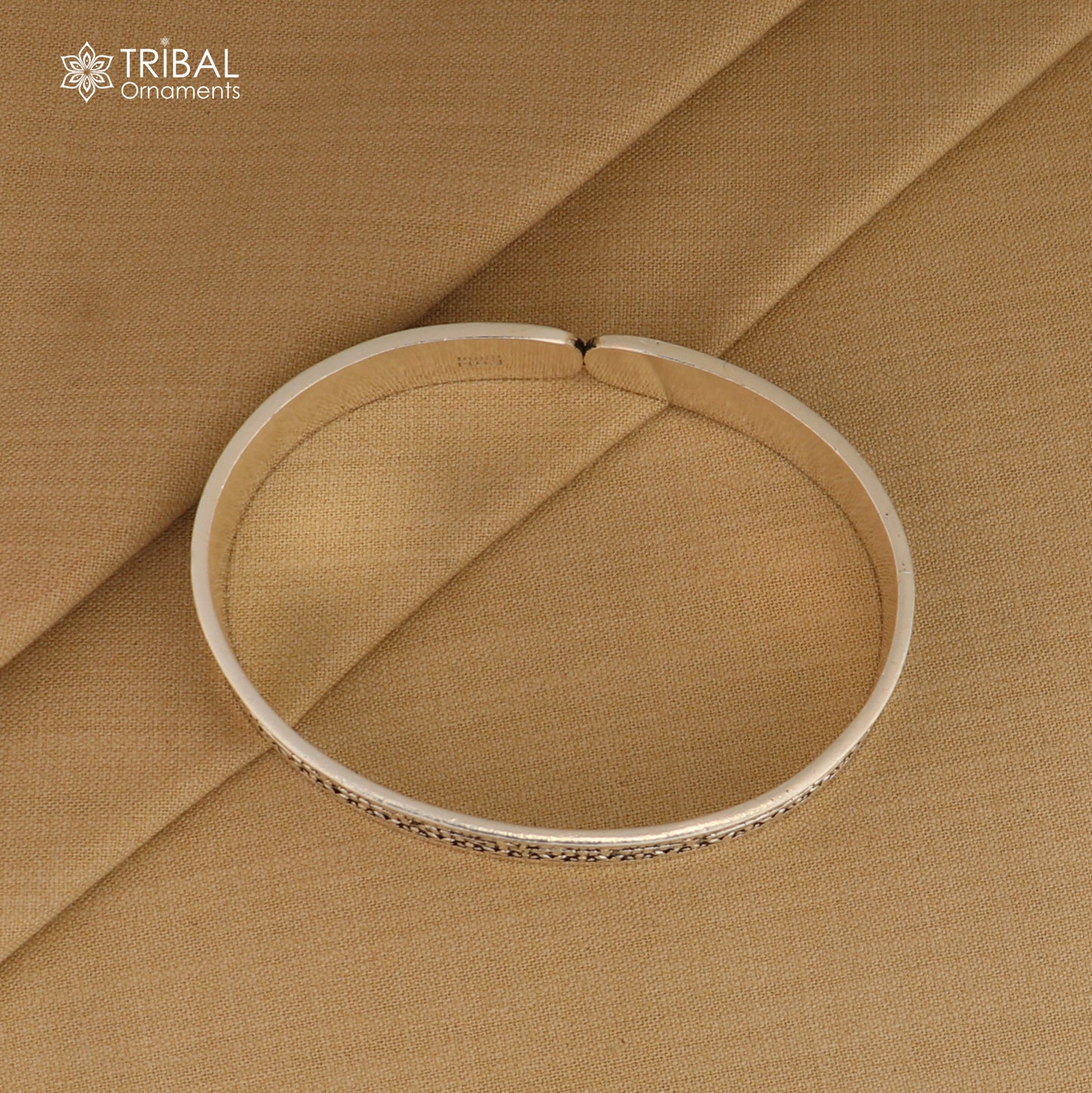 925 Sterling Silver Navkar Mantra bangle cuff for unisex jewelry by TRIBAL ORNAMENTS, featuring engraved spiritual script.
