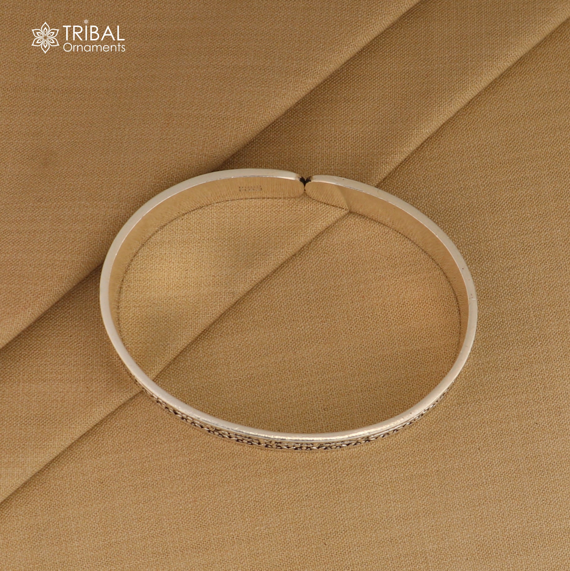 925 Sterling Silver Navkar Mantra bangle cuff for unisex jewelry by TRIBAL ORNAMENTS, featuring engraved spiritual script.