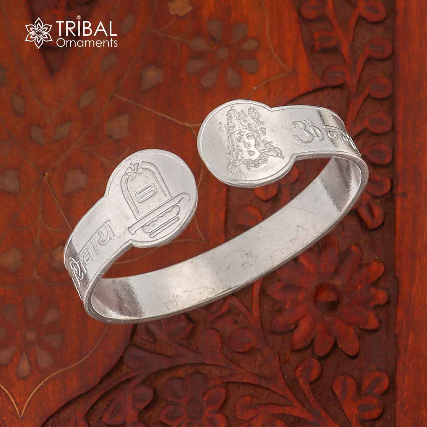 Sterling silver Om Namah Shivay bangle cuff from TRIBAL ORNAMENTS, unisex jewelry with intricate design and traditional motifs.