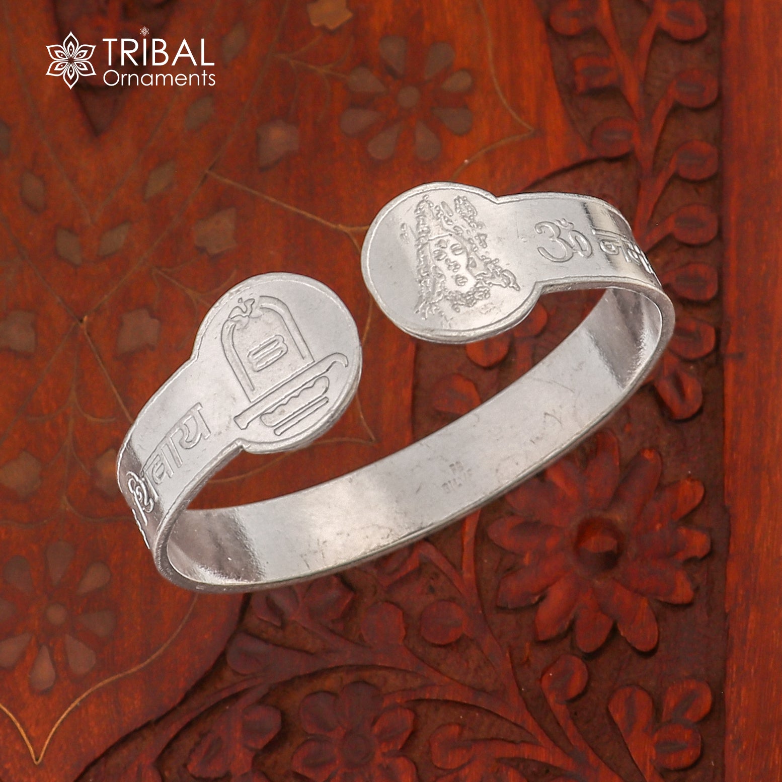Sterling silver Om Namah Shivay bangle cuff from TRIBAL ORNAMENTS, unisex jewelry with intricate design and traditional motifs.