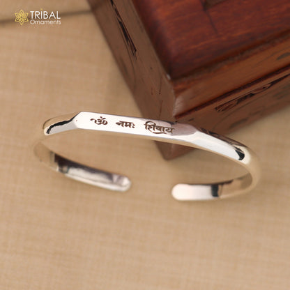 Sterling silver OM Namah Shivay cuff bracelet by Tribal Ornaments, adjustable unisex silver kada with shiny finish and personalized design.