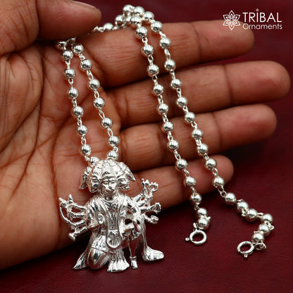 Sterling silver Panchmukhi Hanuman pendant, unisex tribal jewelry by TRIBAL ORNAMENTS, detailed Hanuman face engraving.