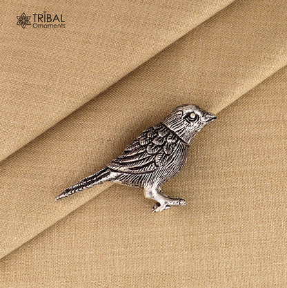 925 sterling silver parrot sculpture by TRIBAL ORNAMENTS, detailed home decor figurine featuring intricate bird design.