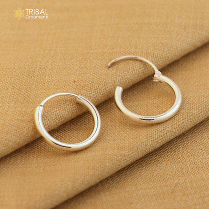 Sterling silver Bali hoops earrings by TRIBAL ORNAMENTS showcasing smooth, tribal-style ethnic jewelry design.