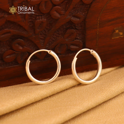 Sterling silver Bali hoops earrings with a plain, tribal design, showcasing traditional ethnic jewelry style.