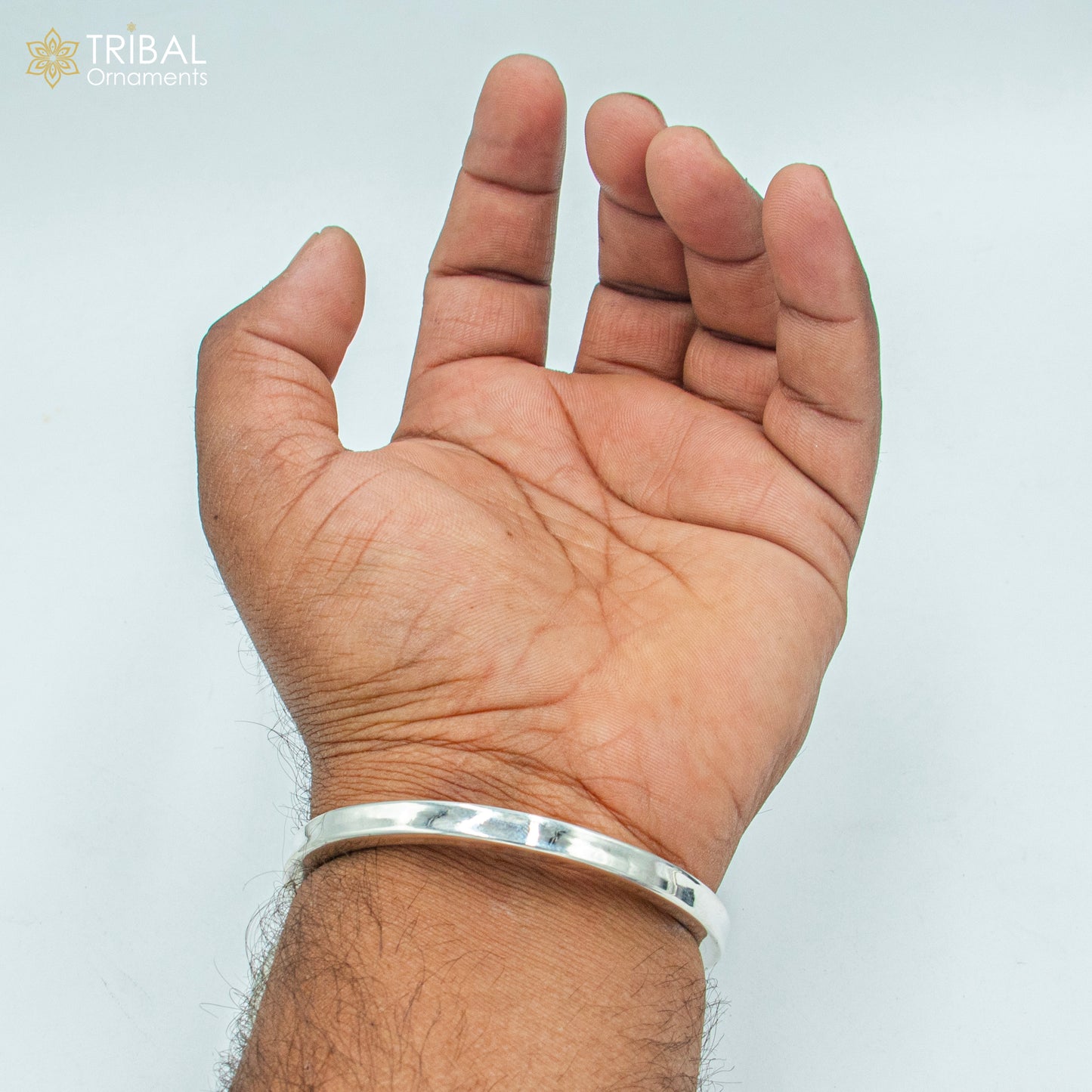 Unisex 925 sterling silver plain bangle bracelet with tribal design from TRIBAL ORNAMENTS, showcasing smooth silver band and tribal jewelry style.