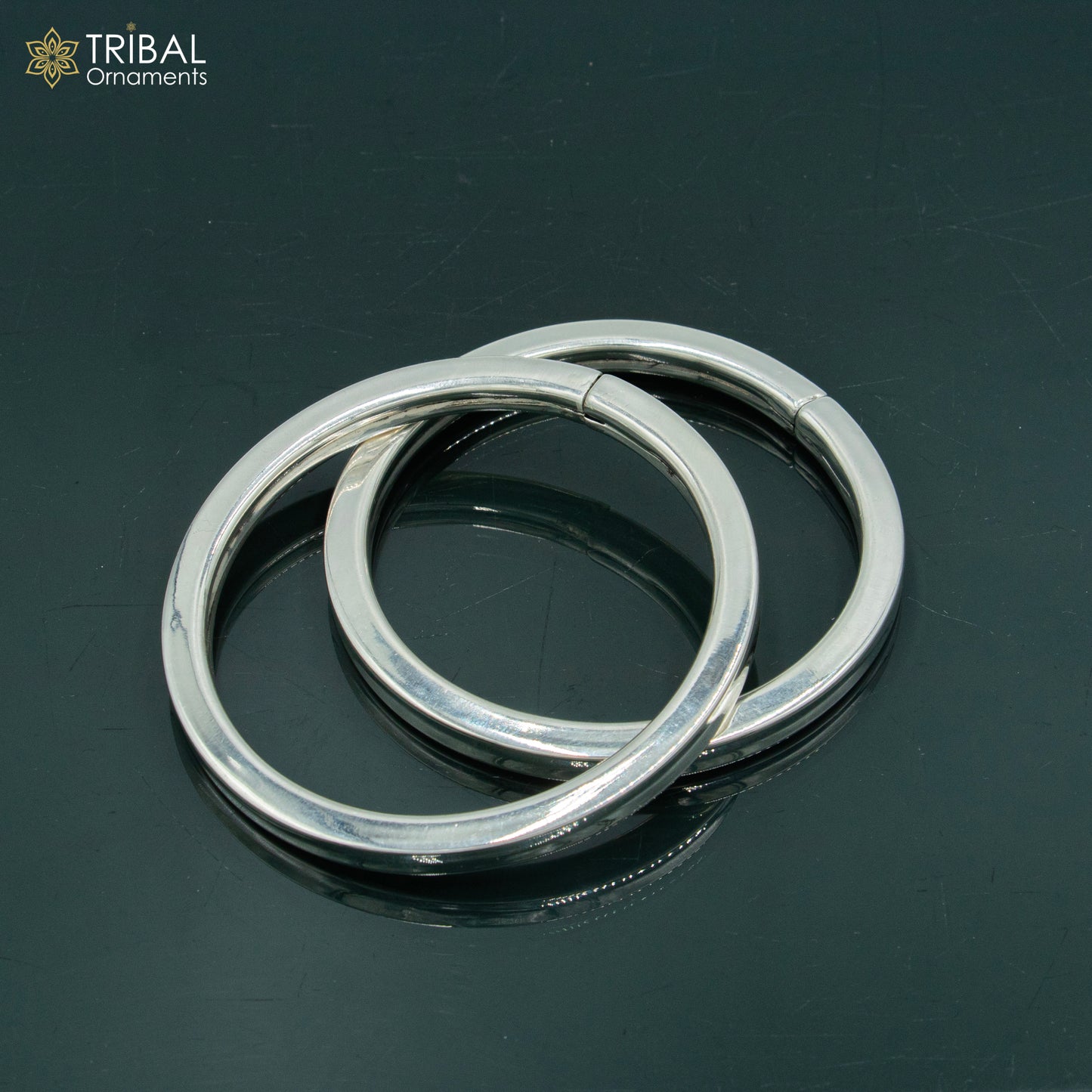 Unisex 925 Sterling silver plain bangle bracelet with a smooth, tribal-inspired design from Tribal Ornaments.