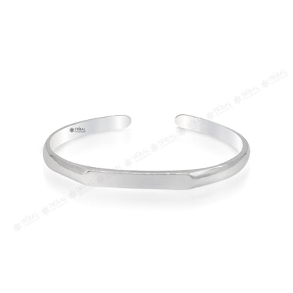 Sterling silver bangle cuff from Tribal Ornaments, shiny and adjustable, suitable for men and women, ideal for personalized gifting.