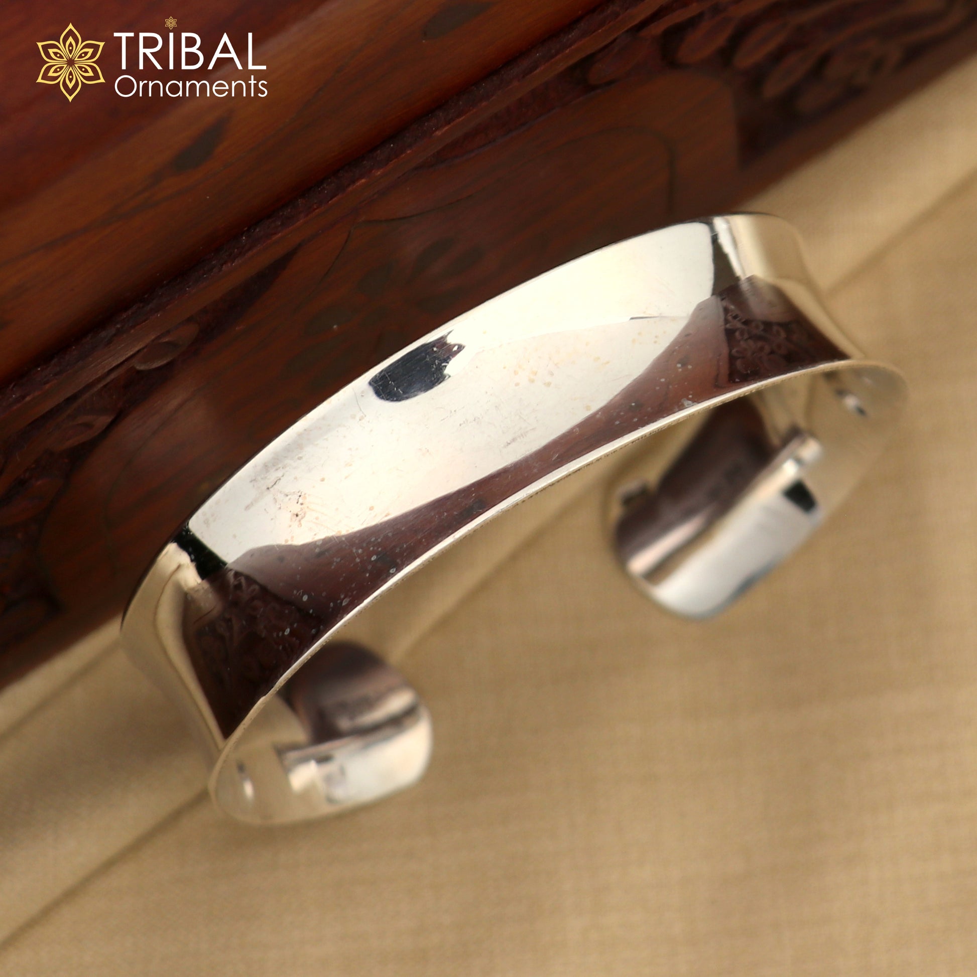 Sterling silver bangle bracelet with shiny, plain design by TRIBAL ORNAMENTS, stylish cuff kada for gifting or everyday wear.