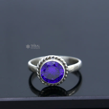 925 sterling silver ring with purple stone, tribal-style jewelry by TRIBAL ORNAMENTS, featuring intricate design and vibrant color.