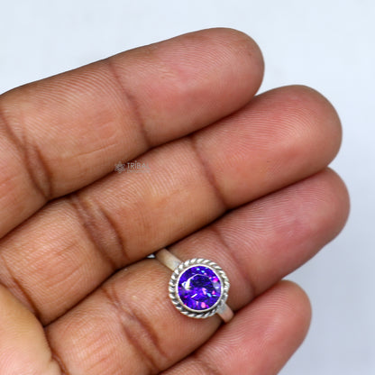 925 sterling silver purple stone ring by TRIBAL ORNAMENTS featuring a vibrant purple gemstone and intricate band design.