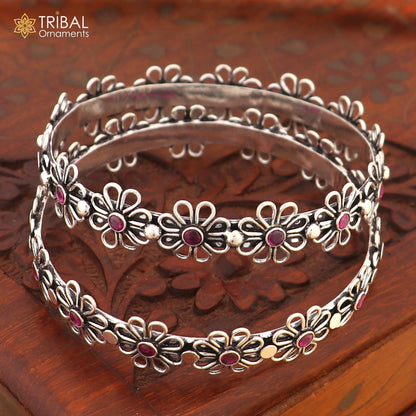 925 sterling silver bangle bracelet with red stone flower design by Tribal Ornaments, showcasing intricate floral jewelry craftsmanship.