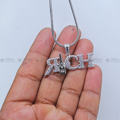 925 Sterling silver men's pendant with tribal-inspired design, crafted by TRIBAL ORNAMENTS, rich and detailed jewelry piece.