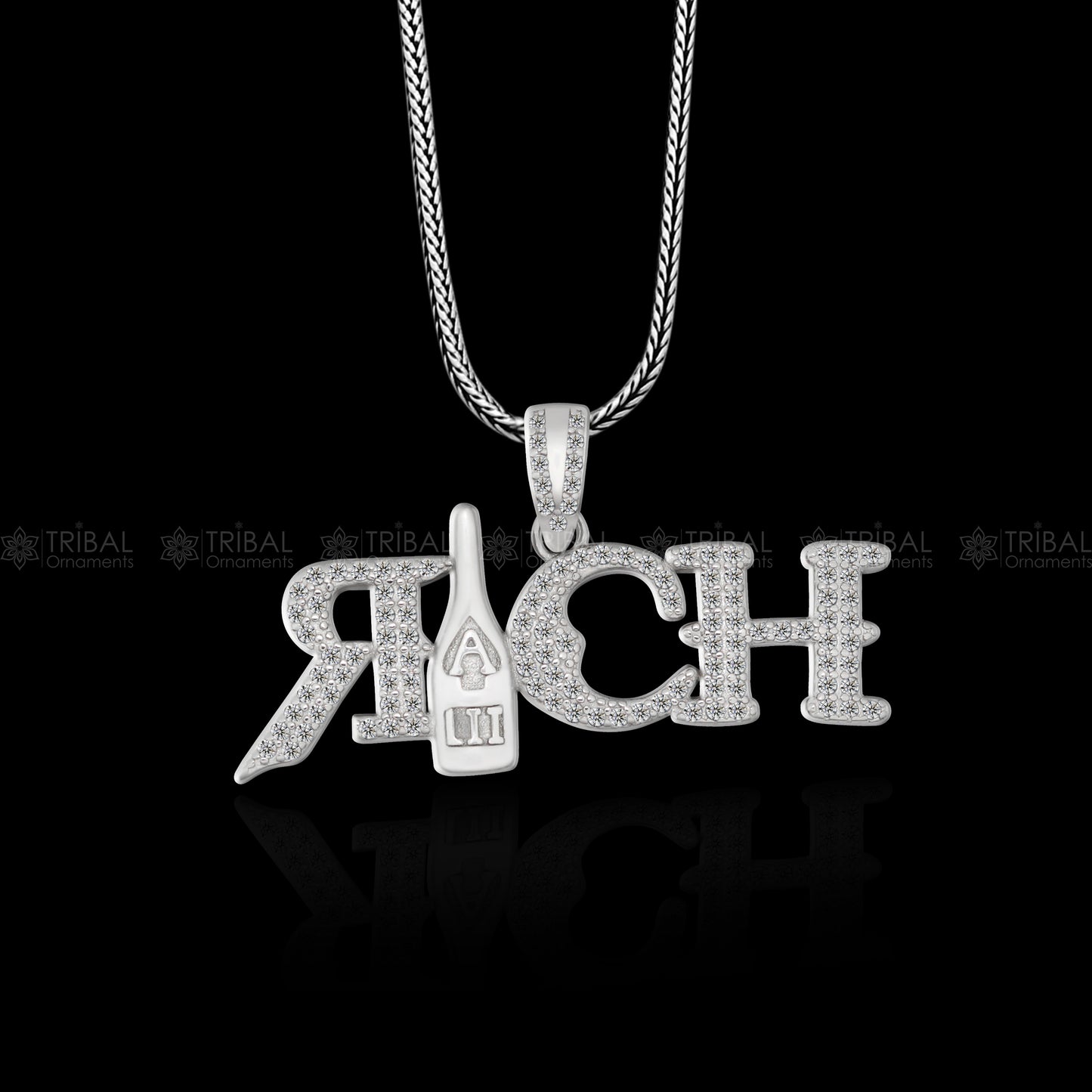 925 Sterling silver men's pendant with tribal design from TRIBAL ORNAMENTS, featuring intricate craftsmanship and bold style.