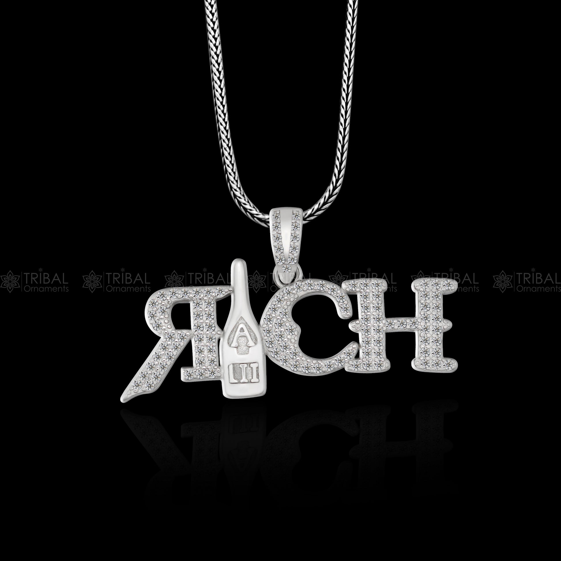 925 Sterling silver men's pendant with tribal design from TRIBAL ORNAMENTS, featuring intricate craftsmanship and bold style.