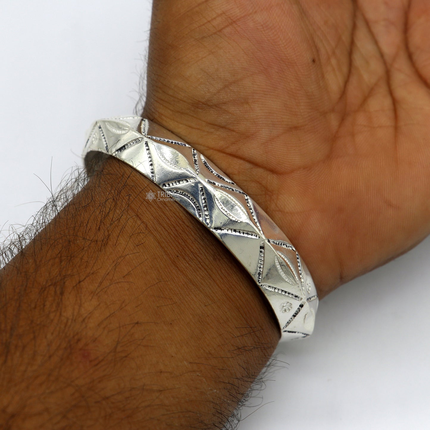 Sterling silver adjustable heavy men's bangle cuff bracelet with traditional Indian design by TRIBAL ORNAMENTS.