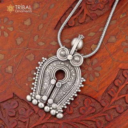 925 sterling silver tribal pendant with antique chitai work, intricate design, showcasing traditional tribal jewelry craftsmanship.