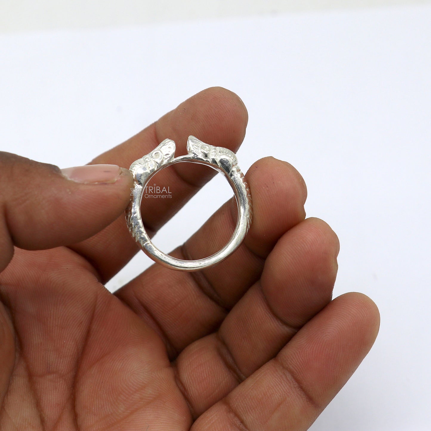 Sterling silver handcrafted crocodile design thumb ring by TRIBAL ORNAMENTS, featuring detailed reptile motif and solid band design.