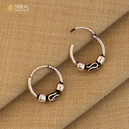 Sterling silver Bali hoops earrings with stylish ball design, featuring tribal and ethnic jewelry motifs by TRIBAL ORNAMENTS