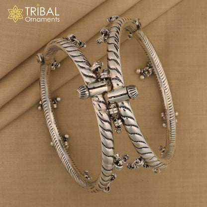 925 sterling silver ankle kada with hanging bells and stylish design, featuring intricate tribal ornament details for the foot.