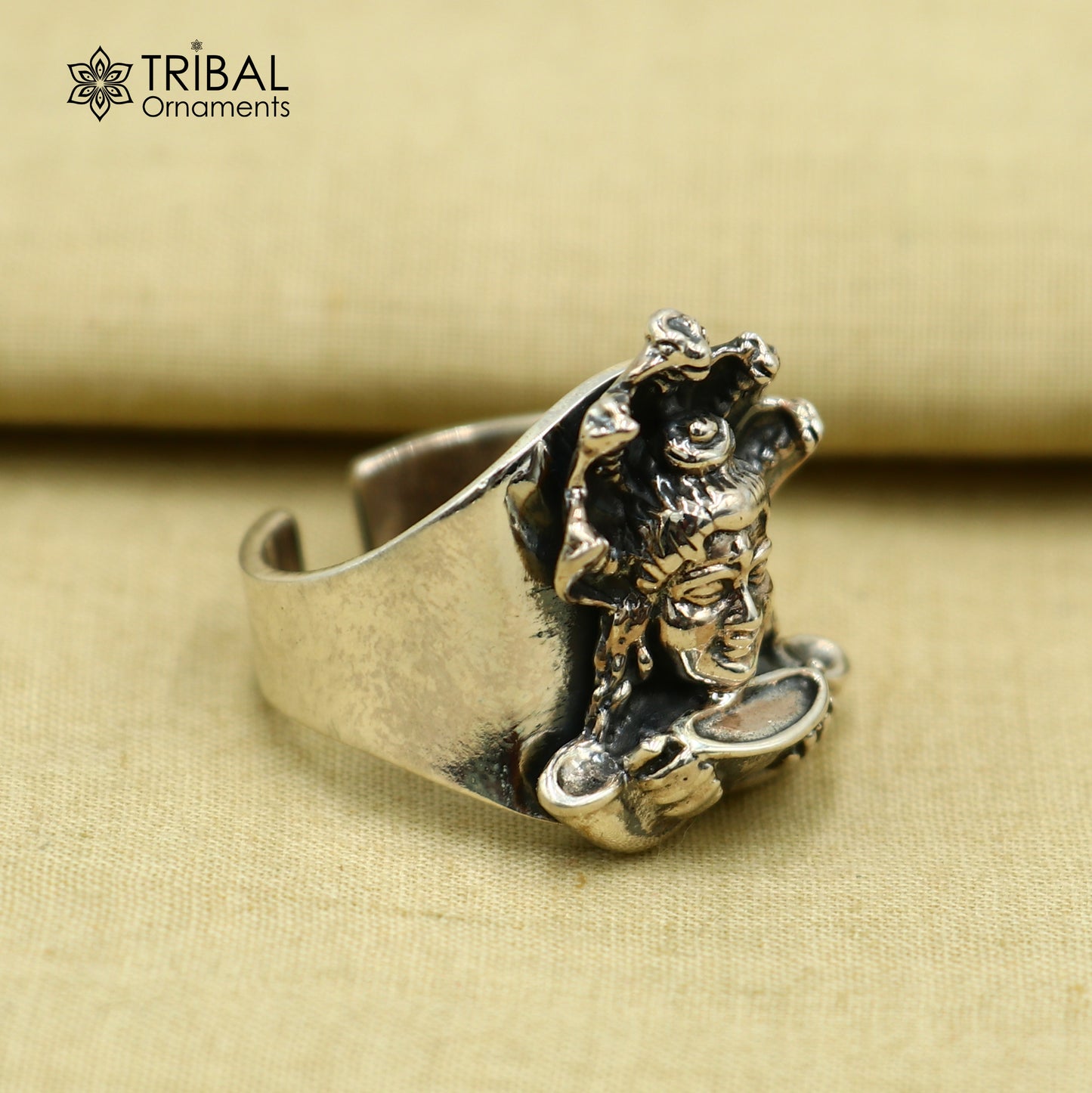 Sterling silver Mahakal design adjustable ring by TRIBAL ORNAMENTS, featuring intricate tribal-inspired jewelry craftsmanship.
