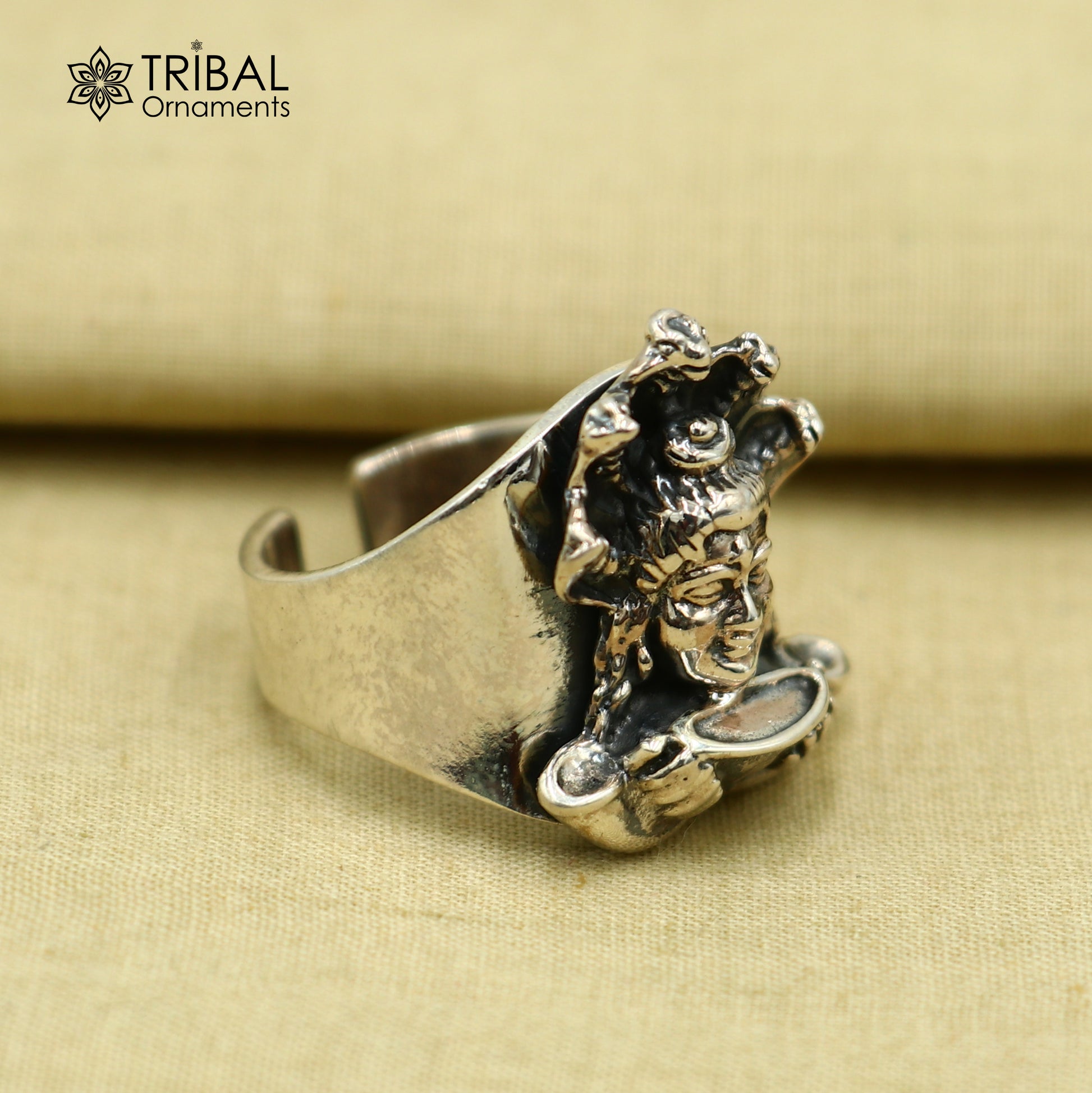 Sterling silver Mahakal design adjustable ring by TRIBAL ORNAMENTS, featuring intricate tribal-inspired jewelry craftsmanship.
