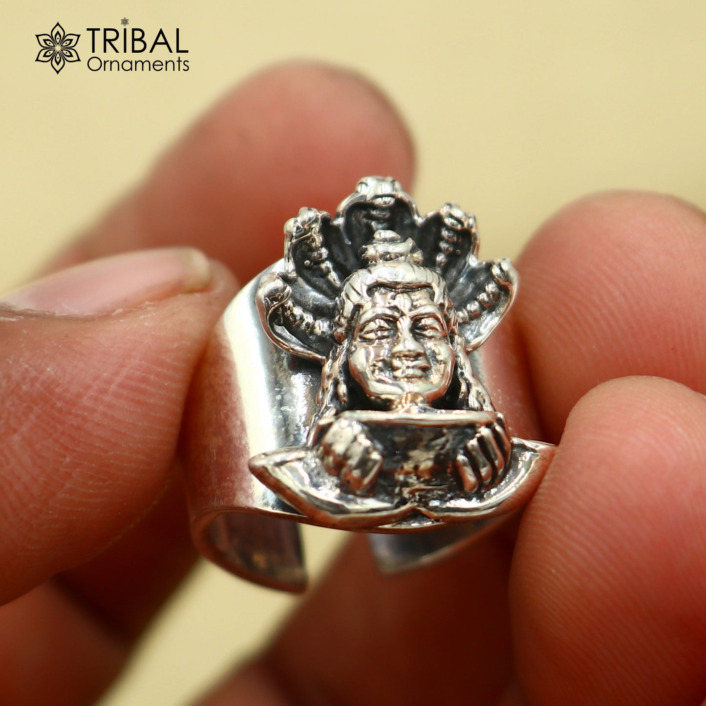Sterling silver Mahakal design adjustable ring by TRIBAL ORNAMENTS, featuring intricate tribal-inspired jewelry craftsmanship.