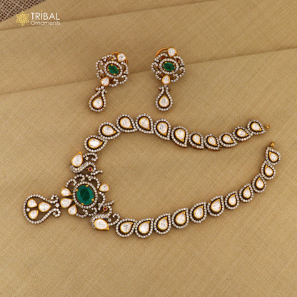 Sterling silver tribal jewelry set with white kundan stone and polki charm necklace and matching earrings from TRIBAL ORNAMENTS.