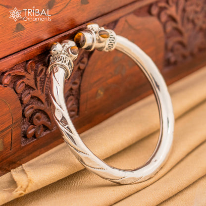 Sterling silver tiger eye stone bangle bracelet with unisex design, featuring customized jewelry from Tribal Ornaments.