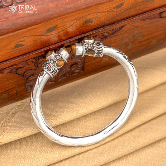 Unisex 925 sterling silver tiger eye stone bangle bracelet with intricate design, customized jewelry by TRIBAL ORNAMENTS.