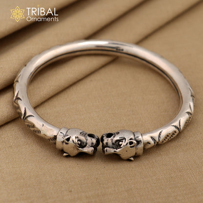 Sterling silver lion face kada bracelet by TRIBAL ORNAMENTS, featuring tribal-inspired stylish bangle with intricate pretty work.