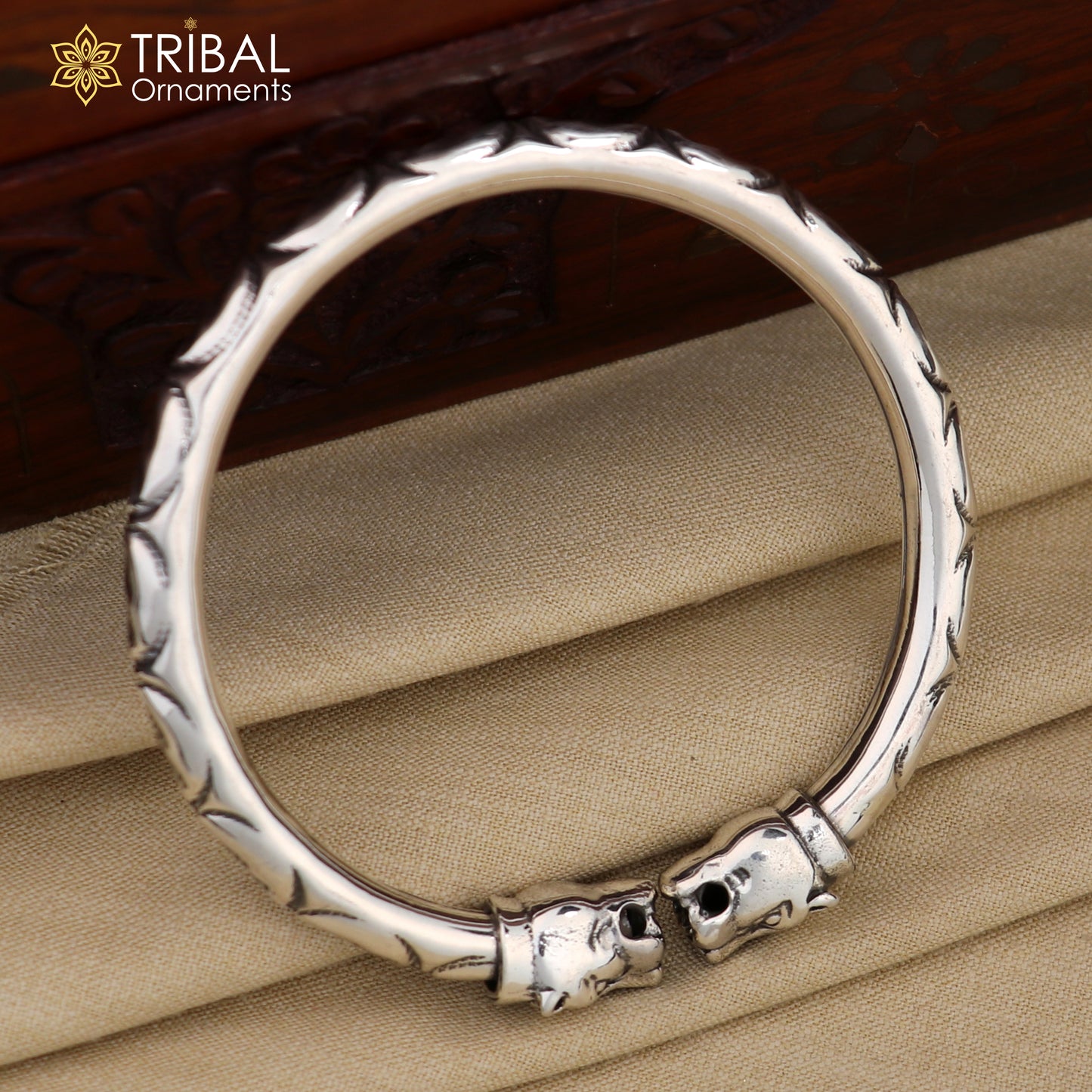 Sterling silver lion face kada bracelet by TRIBAL ORNAMENTS, featuring tribal design and intricate pretty work on stylish jewelry.