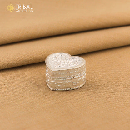 Sterling silver heart-shaped trinket box by Tribal Ornaments, decorative jewelry and eyeliner storage container with intricate design.