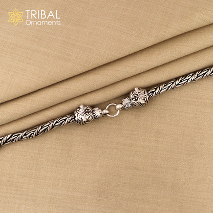 Sterling silver chain bracelet with lion face design by TRIBAL ORNAMENTS, stylish jewelry perfect for gifting.