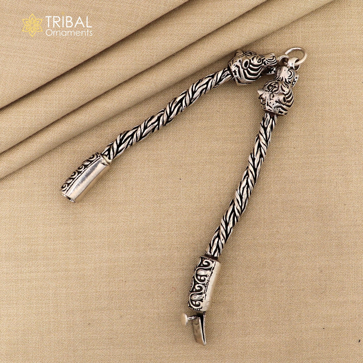 Sterling silver chain bracelet with lion face design by TRIBAL ORNAMENTS, featuring antique style and stylish jewelry details.