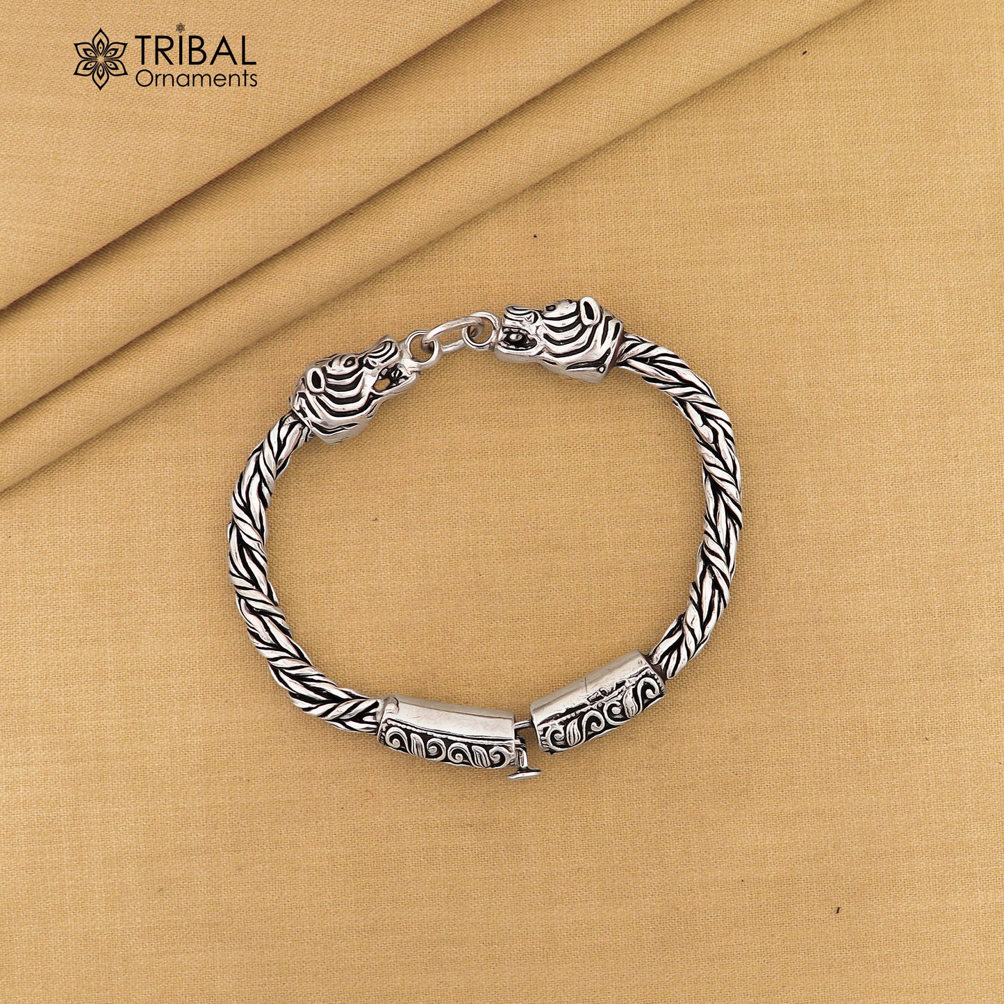 925 sterling silver chain bracelet with lion face design by TRIBAL ORNAMENTS, featuring a stylish and unique antique jewelry look.
