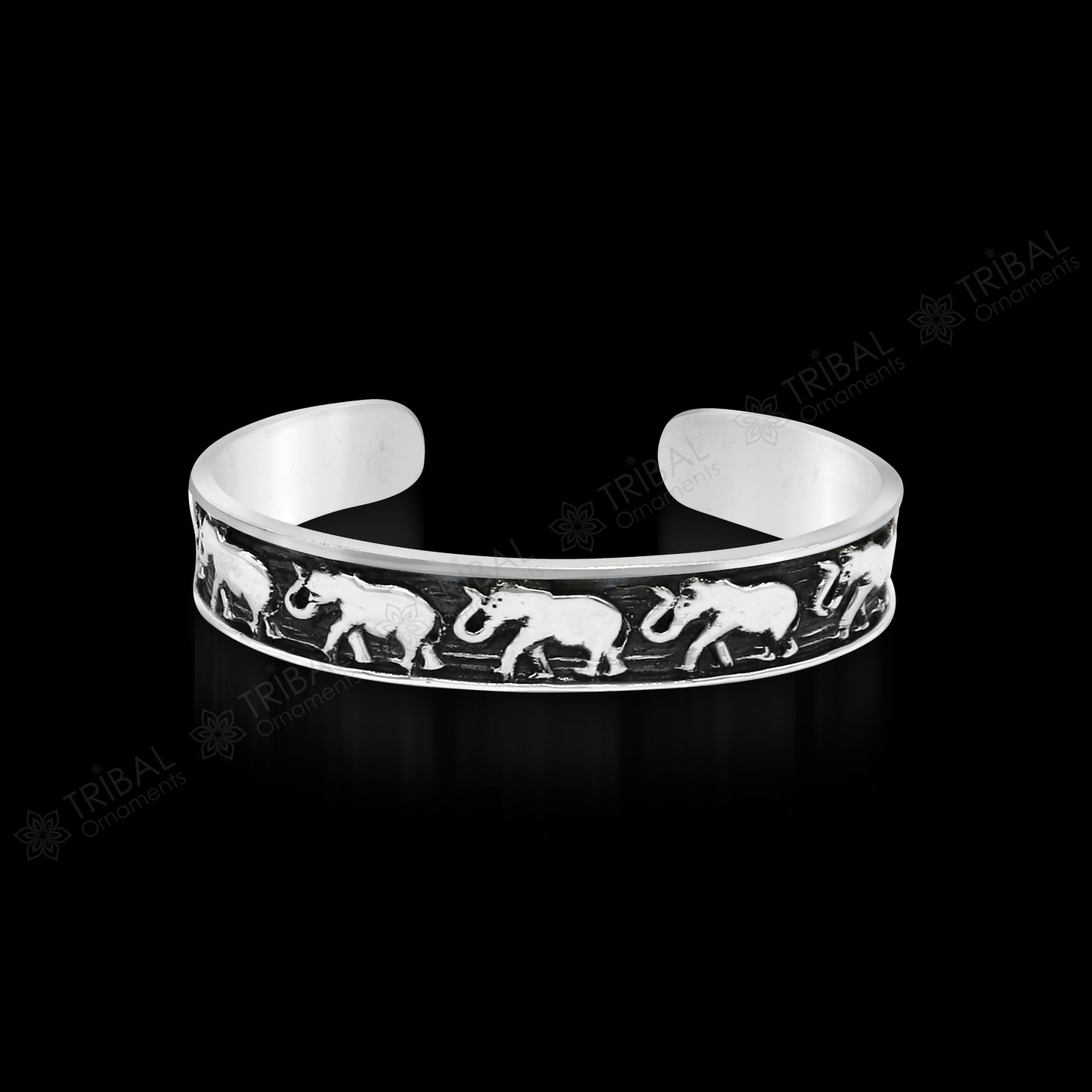 Unisex 925 sterling silver adjustable cuff bracelet with handcrafted elephant tribal design, tribal jewelry by TRIBAL ORNAMENTS.