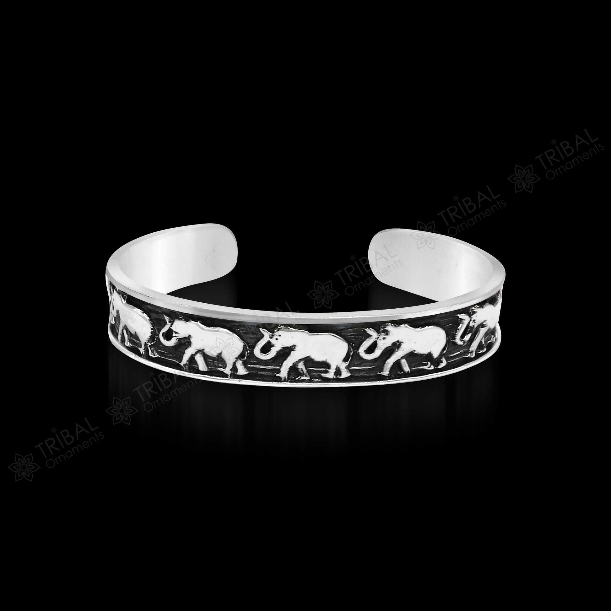 Unisex 925 sterling silver adjustable cuff bracelet with handcrafted elephant tribal design, tribal jewelry by TRIBAL ORNAMENTS.