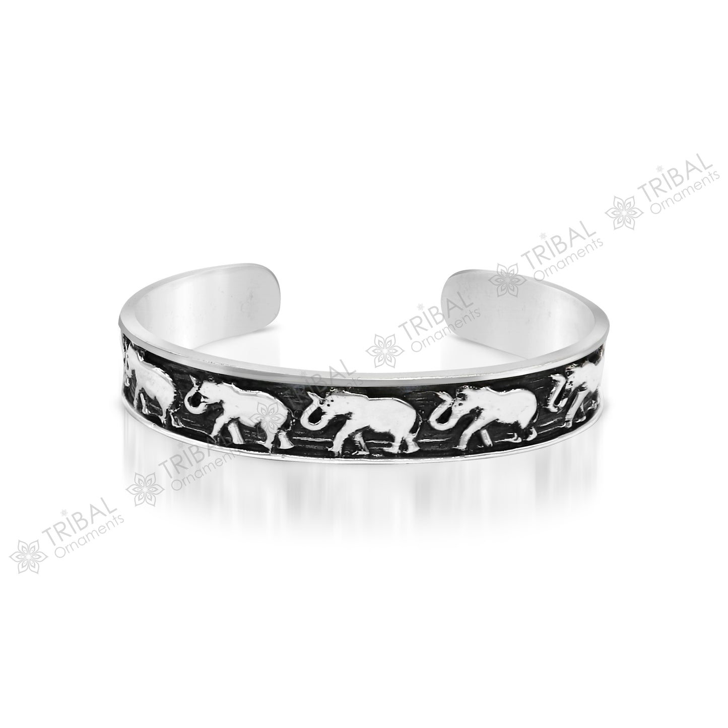 Unisex 925 sterling silver handcrafted elephant design cuff bangle bracelet with adjustable fit and tribal jewelry style.