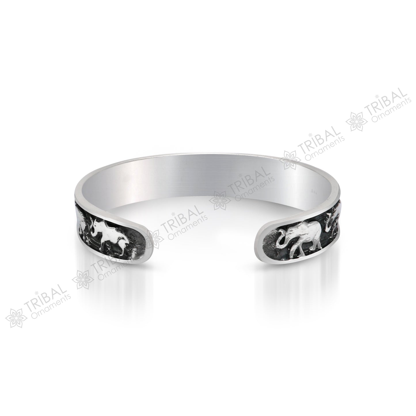 Sterling silver handcrafted elephant design cuff bangle bracelet by TRIBAL ORNAMENTS, adjustable unisex tribal jewelry.