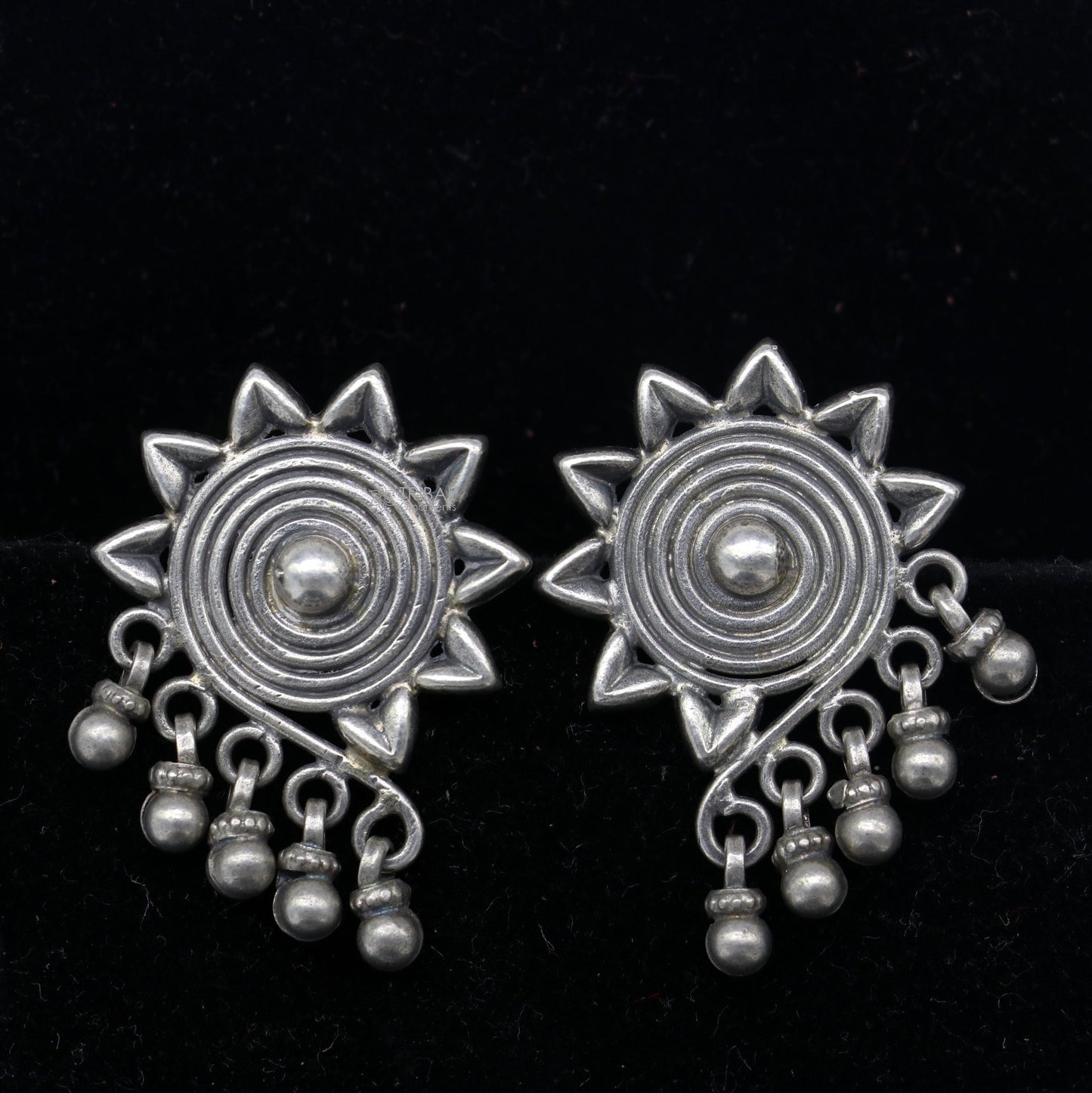 925 sterling silver floral design stud earrings by TRIBAL ORNAMENTS, ethnic bridal jewelry with intricate work and traditional style.