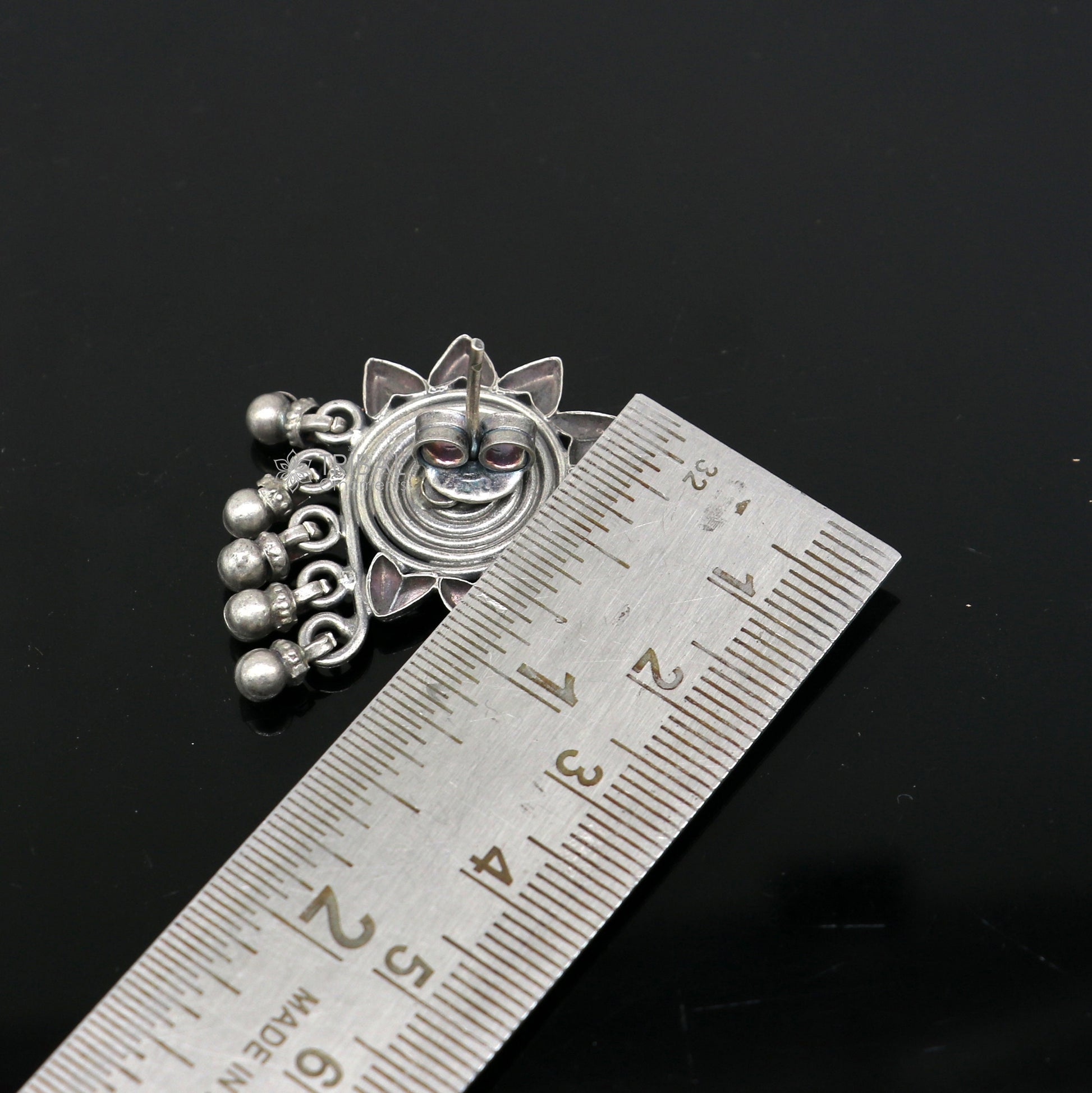 925 sterling silver floral design stud earrings by TRIBAL ORNAMENTS, showcasing intricate ethnic brides jewelry with unique craftsmanship.