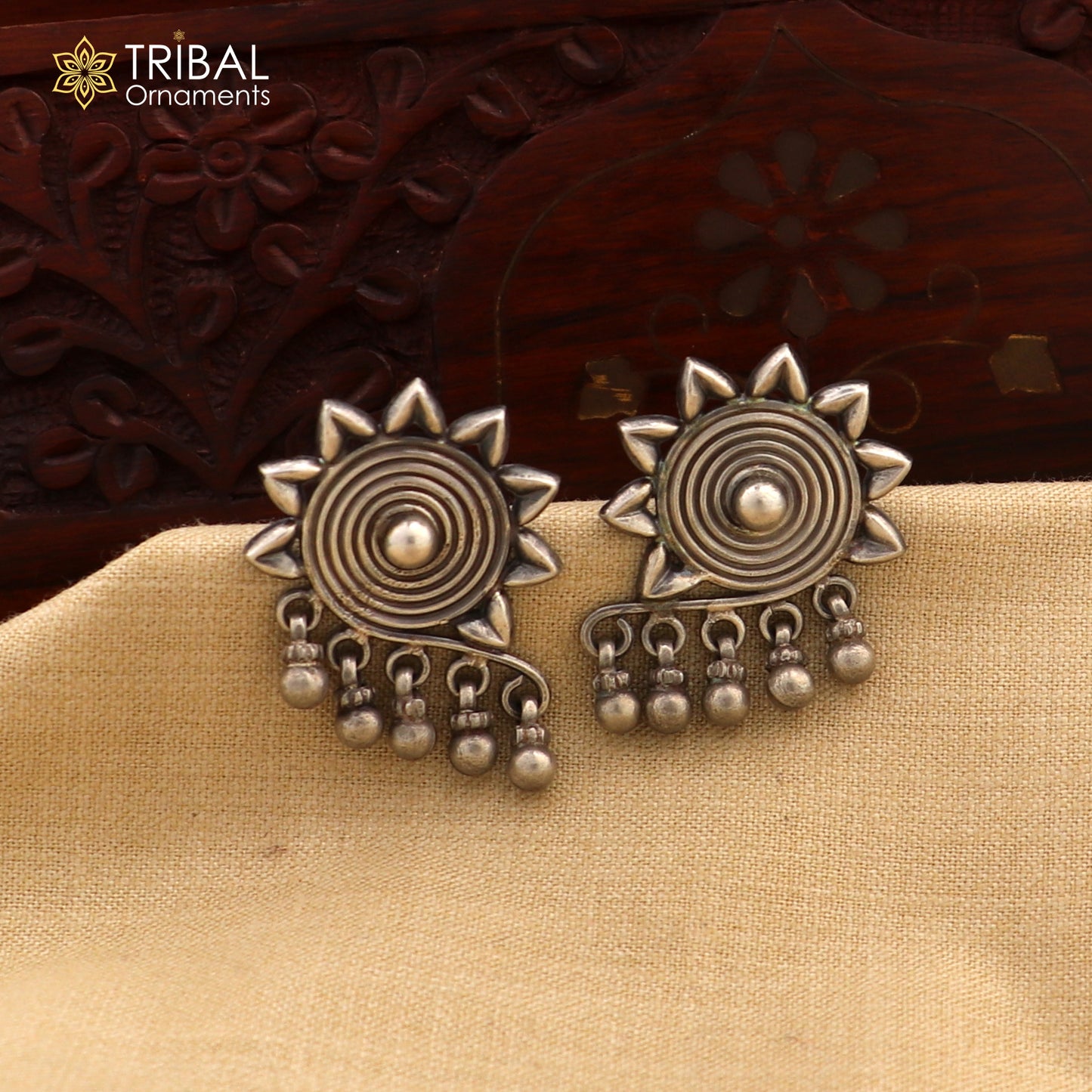 Sterling silver floral design stud earrings by TRIBAL ORNAMENTS, ethnic bridal jewelry with intricate work and traditional Indian style