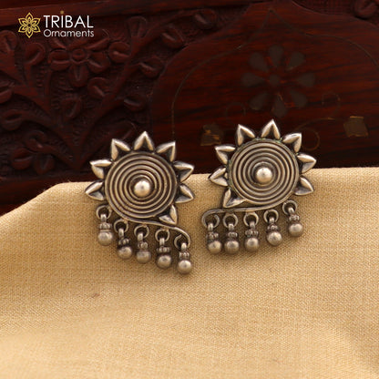 Sterling silver floral design stud earrings by TRIBAL ORNAMENTS, ethnic bridal jewelry with intricate work and traditional Indian style