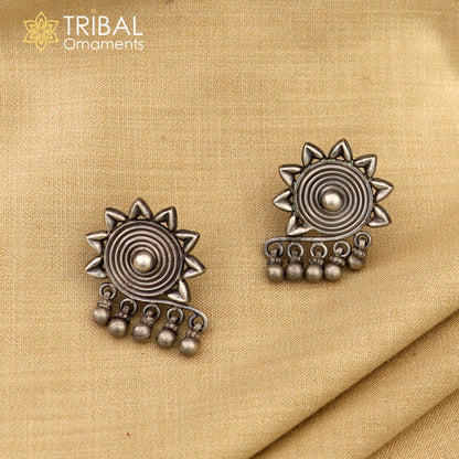 925 sterling silver floral design stud earrings by TRIBAL ORNAMENTS, ethnic bridal jewelry with intricate work.